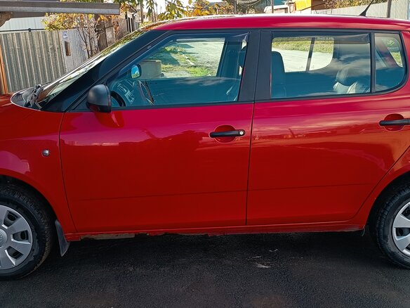 2012 Skoda Fabia II Рестайлинг, красный, 389000 рублей - вид 4