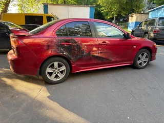 2008 Mitsubishi Lancer X, красный, 850000 рублей, вид 2