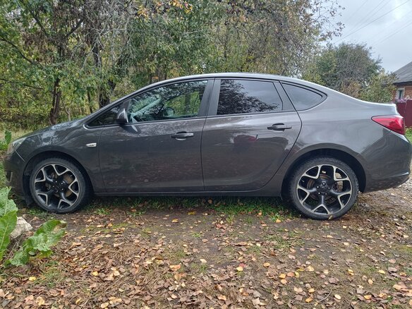 2012 Opel Astra J Рестайлинг, коричневый, 588000 рублей - вид 4