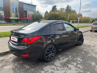 2013 Hyundai Solaris I, чёрный, 680000 рублей, вид 3