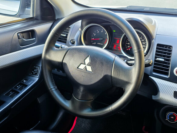 2010 Mitsubishi Lancer X, серебристый, 699900 рублей - вид 11