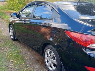 2013 Hyundai Solaris I, чёрный, 850000 рублей, вид 5