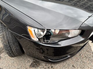 2008 Mitsubishi Lancer X, чёрный, 730000 рублей, вид 2