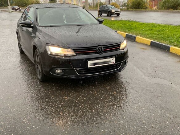 2013 Volkswagen Jetta VI, чёрный - вид 1