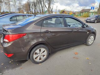 2014 Hyundai Solaris I Рестайлинг, коричневый, 975499 рублей, вид 4