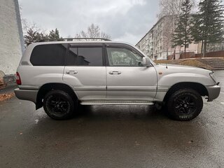 2006 Toyota Land Cruiser 100 Series Рестайлинг 2, серебристый, 2800000 рублей, вид 3