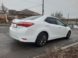 2014 Toyota Corolla XI (E160, E170, E180), белый, 1300000 рублей, вид 4