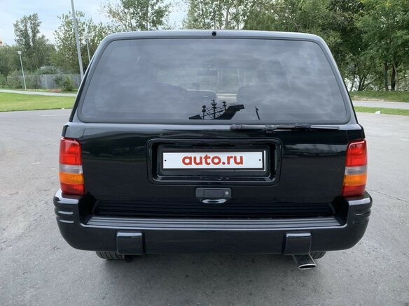 1996 Jeep Grand Cherokee I (ZJ) Рестайлинг, чёрный - вид 4