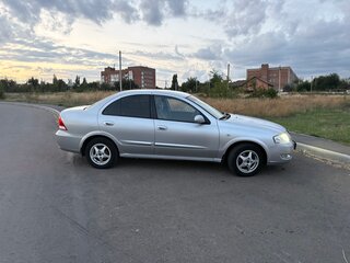 2010 Nissan Almera Classic I, серебристый, 620000 рублей, вид 2