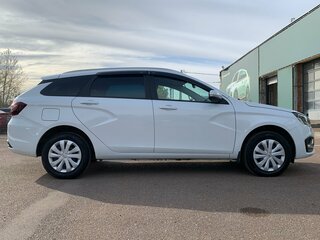 2024 Lada (ВАЗ) Vesta SW I Рестайлинг (NG), белый, 1565000 рублей, вид 4