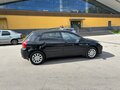 2004 Toyota Corolla IX (E120, E130) Рестайлинг, чёрный - вид 4