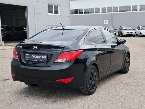 2014 Hyundai Solaris I Рестайлинг, чёрный, 820000 рублей - вид 4