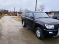 2004 Toyota Land Cruiser 105 100 Series Рестайлинг 1, чёрный, 1200000 рублей - вид 1