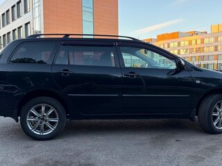 2006 Toyota Corolla IX (E120, E130) Рестайлинг, чёрный, 693000 рублей, вид 3