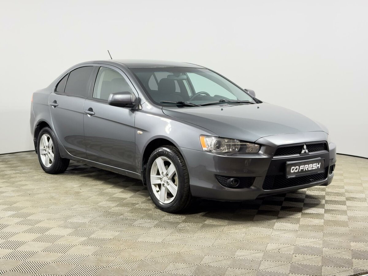 Открыть фотографии: Mitsubishi Lancer X