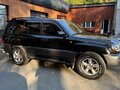 2004 Lexus LX 470 II Рестайлинг, чёрный - вид 4