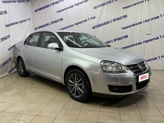2010 Volkswagen Jetta V, серебристый, 580000 рублей, вид 3