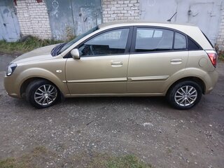 2011 Kia Rio II Рестайлинг, бежевый, 560000 рублей, вид 3