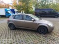 2009 Kia Ceed I, бежевый, 610000 рублей - вид 2