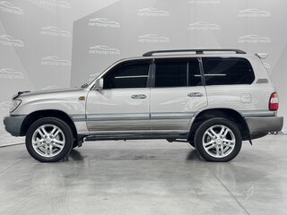2004 Toyota Land Cruiser 105 100 Series Рестайлинг 1, серый, 1680000 рублей, вид 2