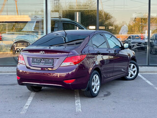 2013 Hyundai Solaris I, фиолетовый, 825000 рублей, вид 2