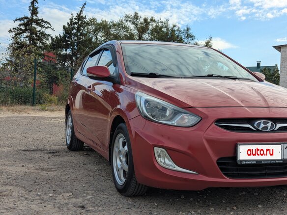 2011 Hyundai Solaris I, красный, 750000 рублей - вид 2