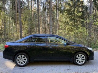 2008 Toyota Corolla X (E140, E150), чёрный, 750000 рублей, вид 5