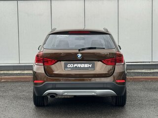 2014 BMW X1 18i I (E84) Рестайлинг, коричневый, 975000 рублей, вид 4