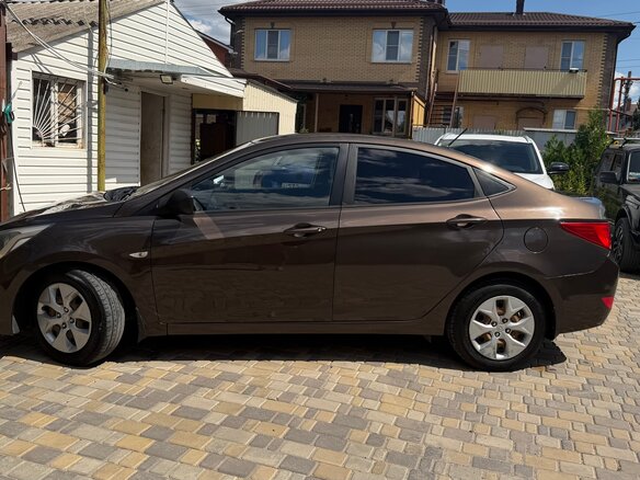 2014 Hyundai Solaris I Рестайлинг, коричневый, 849000 рублей - вид 5