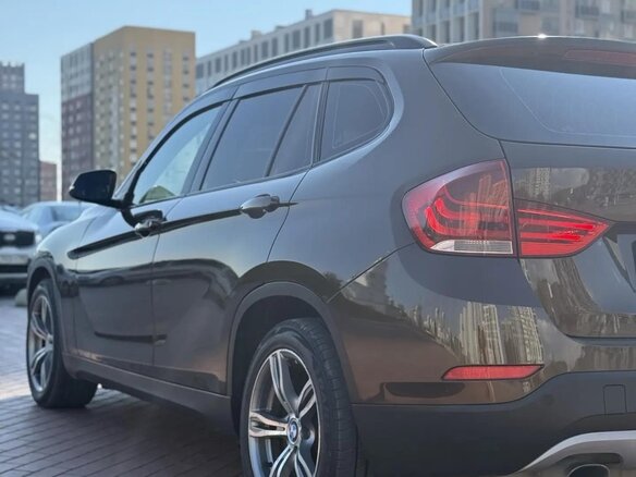 2013 BMW X1 18i I (E84) Рестайлинг, коричневый, 1350000 рублей - вид 6