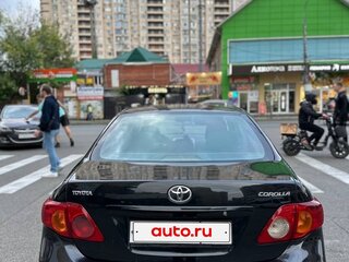 2009 Toyota Corolla X (E140, E150), чёрный, 780000 рублей, вид 4