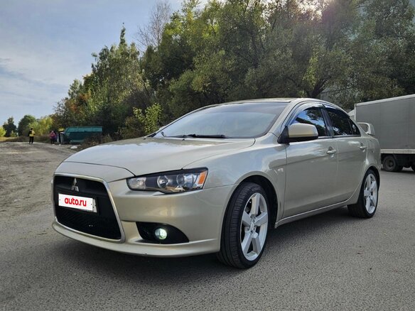 2007 Mitsubishi Lancer X, бежевый, 580000 рублей - вид 1