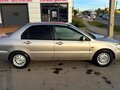 2001 Mitsubishi Lancer Cedia IX, серый, 420000 рублей - вид 5