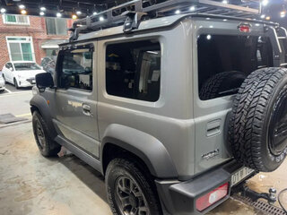2022 Suzuki Jimny Sierra IV, серый, 1957000 рублей, вид 4