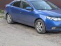 2011 Kia Cerato 5-speed II, голубой, 600000 рублей