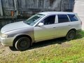 2000 Mazda Familia Y11, серебристый - вид 2