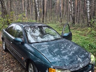 1997 Opel Omega B, зелёный, 125000 рублей, вид 1