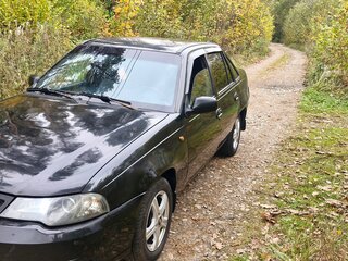 2010 Daewoo Nexia I Рестайлинг, чёрный, 135000 рублей, вид 2