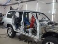 2004 Toyota Land Cruiser 105 100 Series Рестайлинг 1, серебристый - вид 8