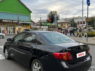 2009 Toyota Corolla X (E140, E150), чёрный, 780000 рублей, вид 3