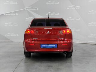 2008 Mitsubishi Lancer X, красный, 699000 рублей, вид 4