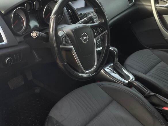 2013 Opel Astra J Рестайлинг, коричневый, 830000 рублей - вид 4