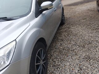 2010 Ford Focus II Рестайлинг, серебристый, 600000 рублей, вид 2