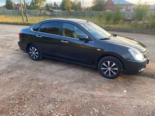 2014 Nissan Almera III (G15), чёрный, 650000 рублей, вид 2