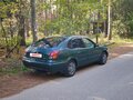 1999 Toyota Corolla VIII (E110), зелёный - вид 3