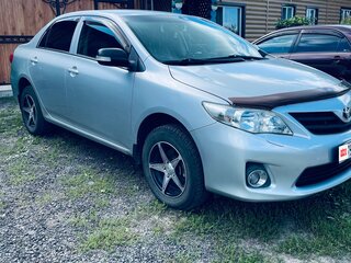 2010 Toyota Corolla X (E140, E150) Рестайлинг, серебристый, 900000 рублей, вид 2