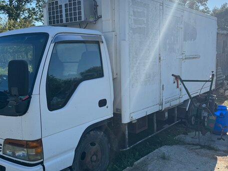 1998 Isuzu Elf (N-series), белый, 900000 рублей, вид 3