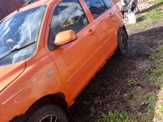 2003 Mazda Demio II (DY), оранжевый, 190000 рублей, вид 4