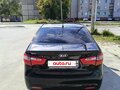 2014 Kia Rio 6-speed III, чёрный, 880000 рублей - вид 4