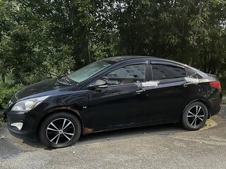 2015 Hyundai Solaris I Рестайлинг, чёрный, 440000 рублей, вид 2